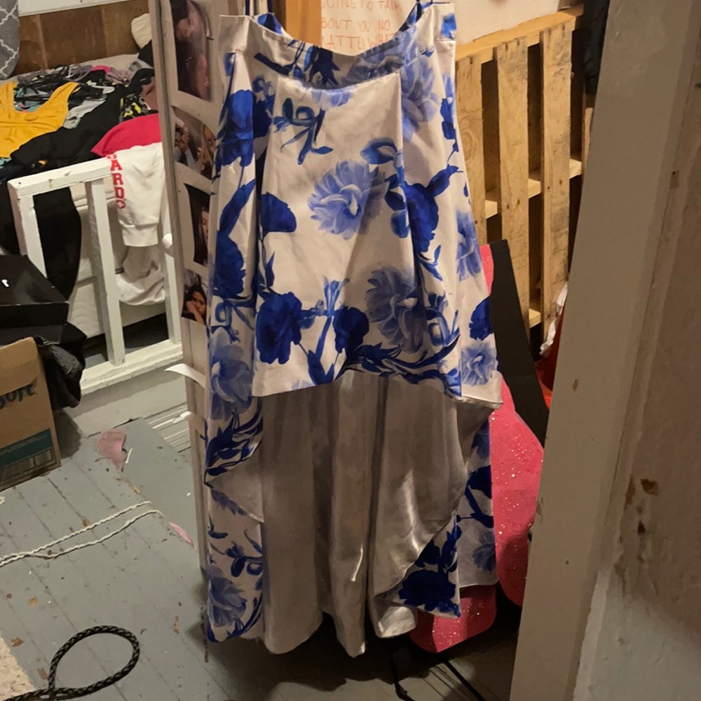 A blue and white banquet or prom dress
